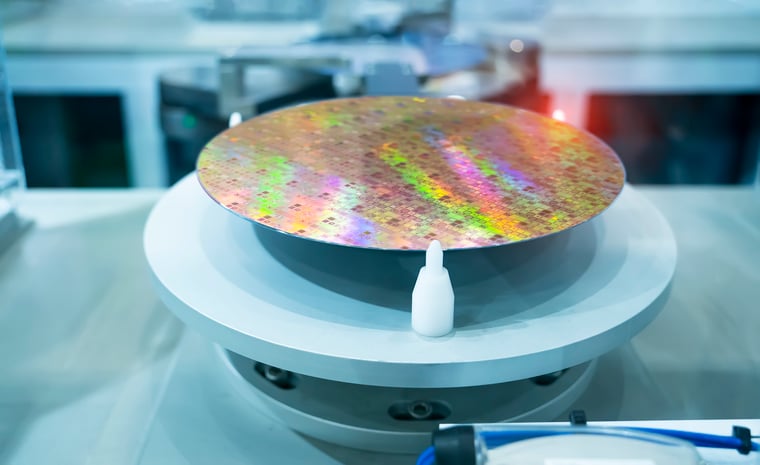  the reflective surface of wafer discs must be reliably read to pinpoint and trace each wafer through the production process 